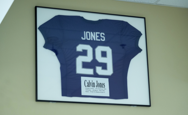 Calvin Jones football jersey hangs in the gym lobby